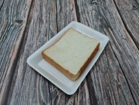 Bread made from flour and other ingredients with spread or filling with blueberry jam