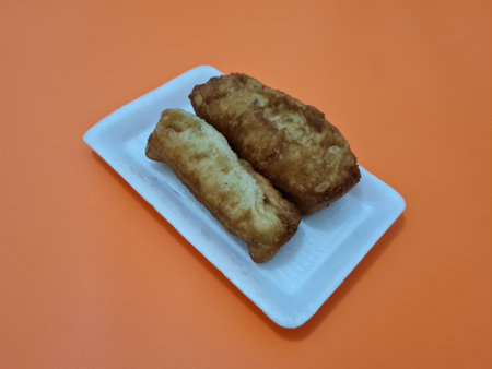Snacks from the market are fried bread that is oval in shape with a sweet tasteの写真素材