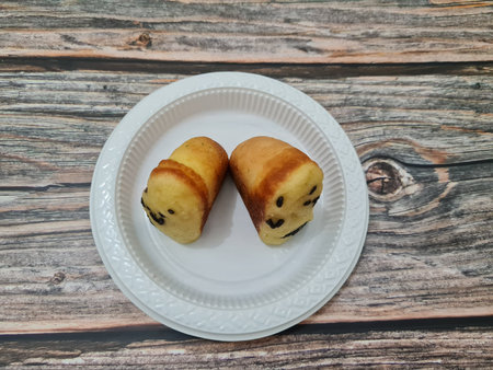 Chocolate flavored pukis cake made from flour and other ingredients