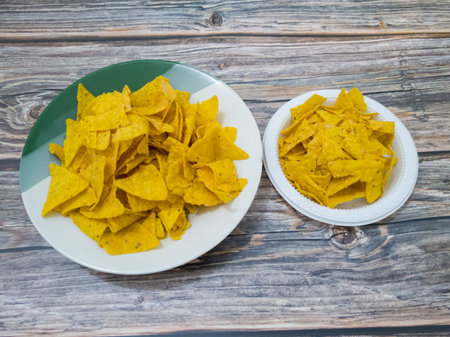 Crispy chips made from corn and other ingredients with a savory tasteの写真素材