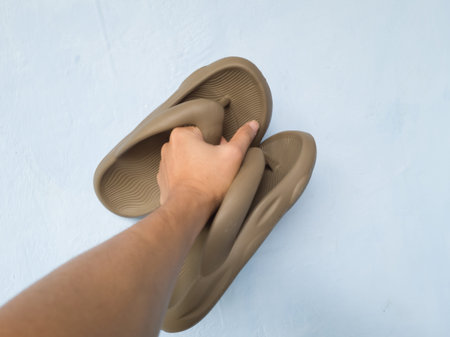 Brown women's sandals made of rubber can be used for walking