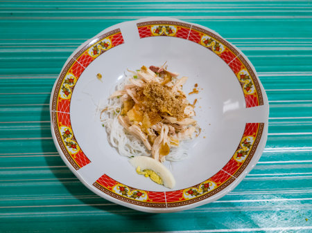 Rice with pork in a bowl on the table, Thailand.の写真素材