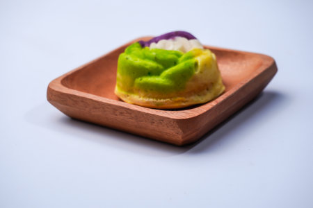 A colorful market snack made from flour and other ingredients called blooming sponge cakeの写真素材