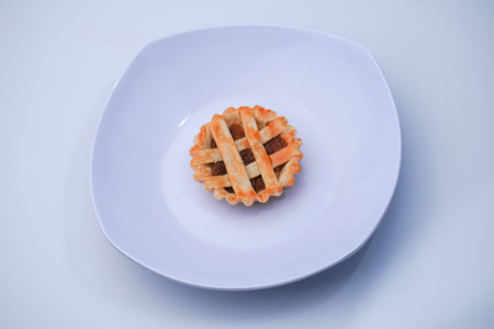 Dry cake made from flour and other ingredients baked in pineapple jam pie