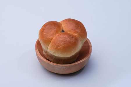 Market snack bread filled with jam on a white background