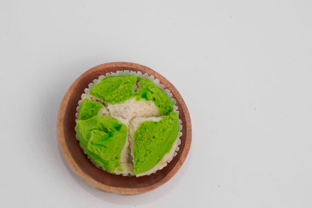A market snack originating from Indonesia is called green steamed sponge cake