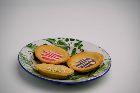 A market snack originating from Indonesia is called milk pie with various flavors