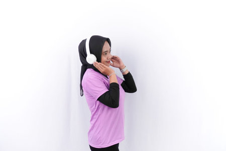 Indonesian Asian woman in purple dress doing sports