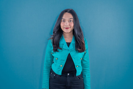 Indonesian Asian woman smiling standing straight