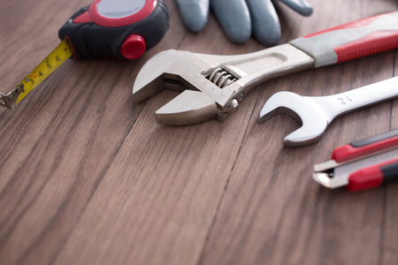 Working tools on wooden backgroundの写真素材