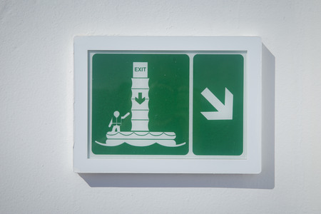 Emergency exit sign on a cruise ship - safety on seaの写真素材
