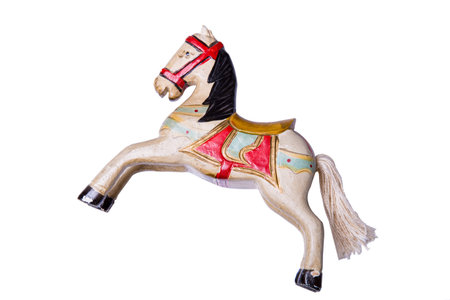 Handmade old wooden horse toy isolated on white backgroundの写真素材