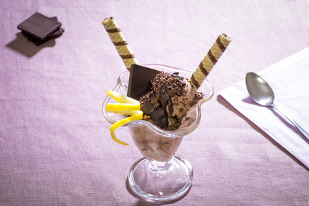Decorated chocolate ice cream in a glass jorumの写真素材