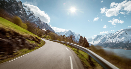 Narrow mountain road in Norway at high speedの写真素材