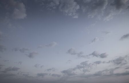 Night sky with fluffy cloudsの写真素材