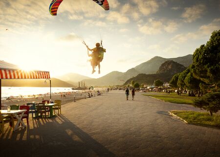 Oludeniz, Turkey - August 14, 2017: Tandem paragliding in Oludeniz, Turkeyのeditorial素材