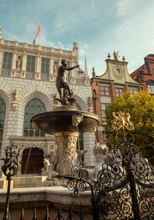 Neptune's fountain in the old town of Gdansk city, Poland