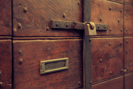 Old wooden door with post openingの写真素材