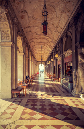 Passage with cafes and restaurants at San Marco square in Venice, Italyの写真素材
