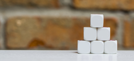 empty dices on brick backgroundの写真素材