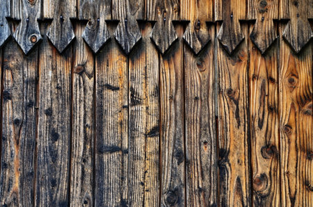 vintage wood background texture with knots and nail holesの写真素材