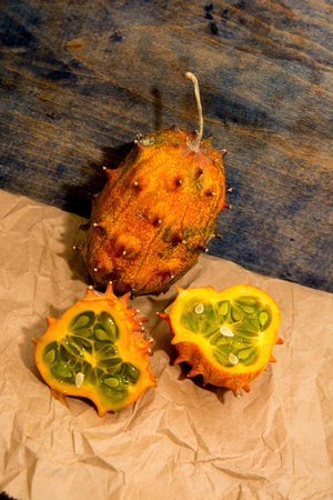 Sliced Fruit Kivano (Kiwano) melon on wooden background. Close up.の写真素材