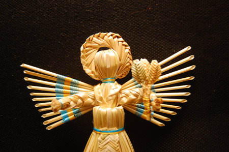 Hand-made straw products: angels, dolls, birds, buzzers, bells. Traditional straw products. Ukraine.の写真素材