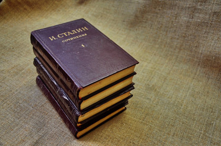 November, 2020. Lviv. Ukraine. Books with a portrait of Stalin and his written works.のeditorial素材