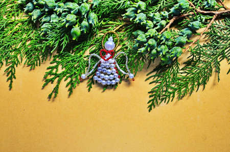 Merry Christmas and a happy new year. Christmas and with the New Year symbolizes the traditional Christmas angel. Winter holidays, signs and signs.の写真素材