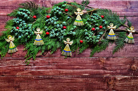 Merry Christmas and a happy new year. Christmas and with the New Year symbolizes the traditional Christmas angel. Winter holidays, signs and signs.の写真素材