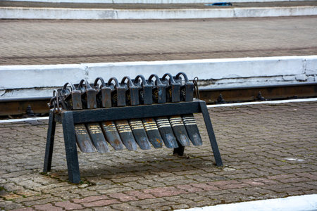 railway brake shoes of black color lie on the black. railway skid. railway station. train shoe.