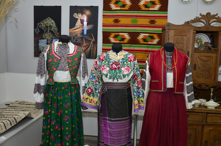 Traditional Ukrainian national clothing handmade with embroidered flowers and ornaments. Exhibition...