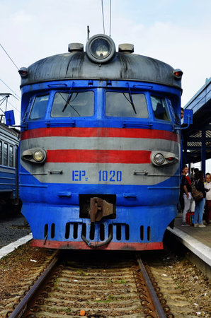 LVIV, UKRAINE.January 2021. Ukrainian passengers are waiting train moving on Lviv Railway Station,...
