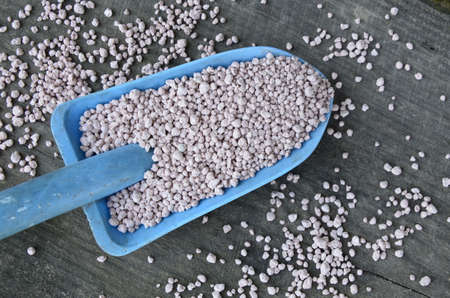 Nitrogenous fertilizer.Fertilizer granules.close up chemical Fertilizer in sacks.Chemical fertilizer in sack, blurry background, NPK fertilizer for plants.の写真素材