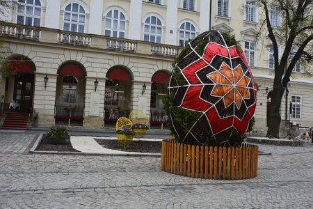 Lviv. Ukraine. April, 2021. A large Easter egg woven from vines and branches. Decorative decoration of the city space on the feast of Christ's Resurrection.のeditorial素材