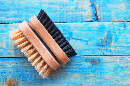 Clothes brush on a white background. It helps to clean the dust on clothes.Clothes brush on the...