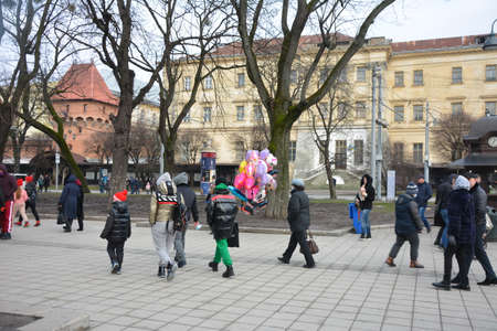 Lviv. Ukraine. January 2021.beautiful city center and wooden cabins for market covered in snow. european city before christmas holidays.Safe Christmas in Lviv. Quarantine and pandemic.のeditorial素材