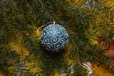 Christmas background - baubles and branch of spruce treeの写真素材