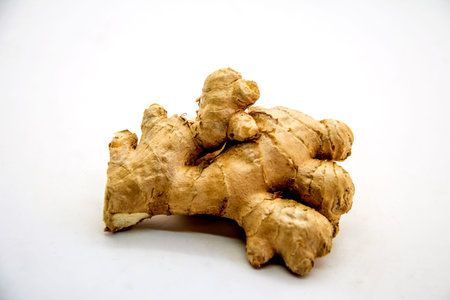Ginger root isolated on white background Ginger (Zingiber)