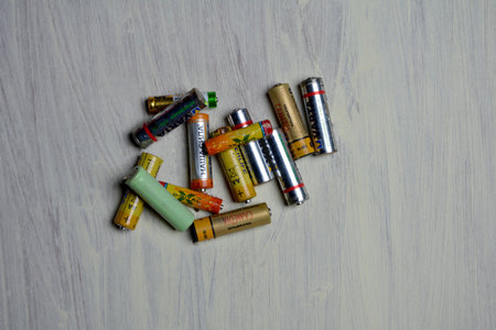 Kiev. Ukraine. December. 2021. Used batteries from different manufacturers, waste, collection and recycling, high danger for the environment.のeditorial素材