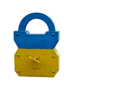 Barn lock figure is isolated on uniform background. The yellow-blue barn castle is giant in sizeの写真素材