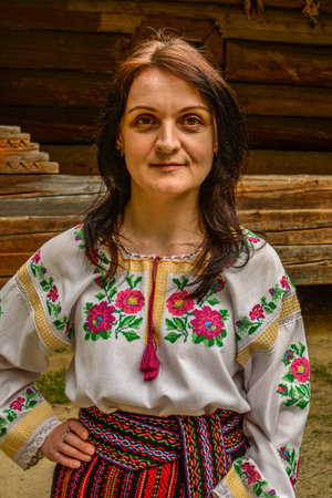 Faith and pride. Emotive woman in ukrainian traditional cloth - embroidery shirt. Ukrainian culture....