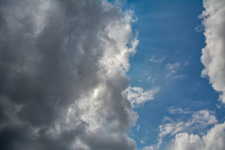 blue sky with clouds and sun reflection.The sun shines bright in the daytime in summer