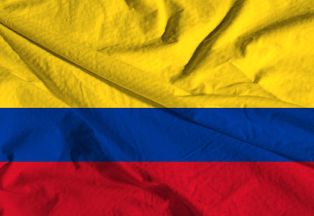 Colombia embroidery flag. Colombian emblem stitched fabric. Embroidered coat of arms. country symbol textile background.の写真素材