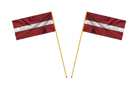 Latvia flag with big folds waving close up under the studio light indoors. The official symbols and colors in fabric banner.の写真素材
