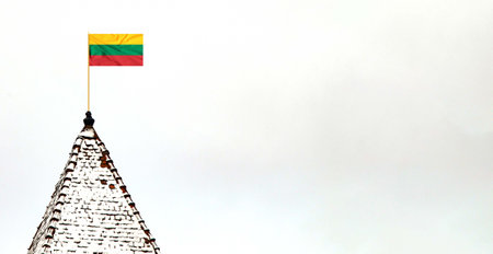 Lithuanian flag blowing in the wind .Flag of Lithuania waving, real fabric texture .の写真素材