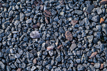 Small stones wall used for background texture.Small Rock Textured background. Seamless texture of...