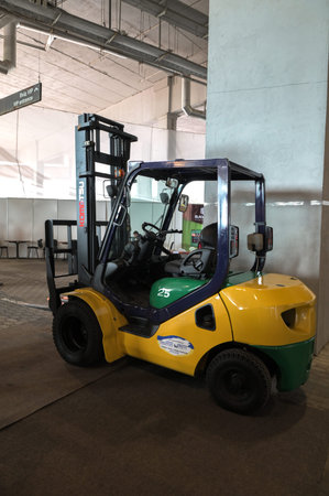 Lviv, Ukraine. January 10, 2024.Forklift loader. Pallet stacker truck equipment at warehouse.