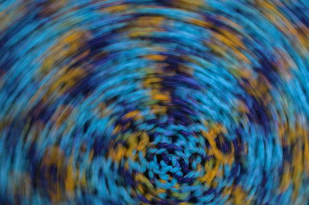 Blurred texture image.Simulates circular rotation.Knitted wool texture, cozy and warm patterned...