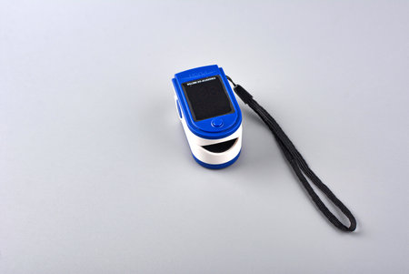 Lviv, Ukraine. 14 February 2024.Pulse oximeter for measuring blood oxygenation pulse and blood vessel filling.Pulse oximeter device to measure pulse rate and oxygen levels.のeditorial素材